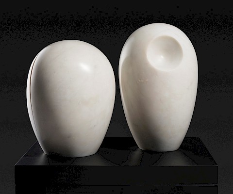 Barbara Hepworth (Wakefield, Yorkshire, England, 1903 - 1975, St. Ives, Cornwall, England), "Two Heads (Christmas)," 1970, white polished marble on artist-designed wood base, 17 x 20 1/4 x 15 1/4 in., Arkansas Museum of Fine Arts Foundation Collection: Bequest from the Estates of Louise and Fred Dierks. 2012.008.005. Photography by Edward C. Robison III.