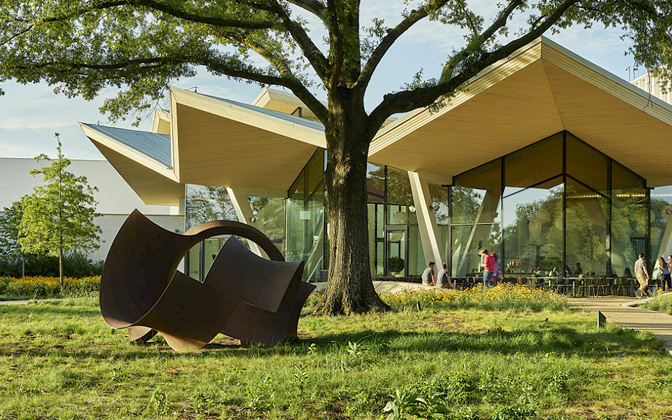 Photo of the Park Entrance to AMFA with a large metal outdoor sculpture in the foreground.