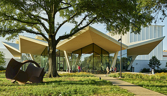 Photo of the Park Entrance to AMFA with a large metal outdoor sculpture in the foreground.