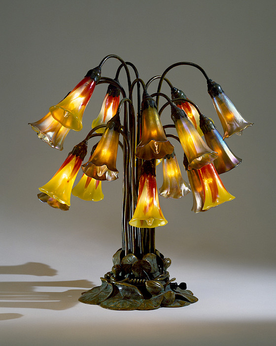 Tiffany Glass and Decorating Company (1892 - 1900), "Eighteen-Light Pond Lily Lamp," circa 1900, blown glass and bronze, 20 1/4 x 18 in., On loan from the Chrysler Museum of Art, Gift of Walter P. Chrysler, Jr. 0.2391. Image courtesy of the Chrysler Museum of Art. Photography by Edward Pollard, © Tiffany Studios.