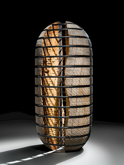 Todd Hoyer (Beaverdam, Wisconsin, 1952 - ), "Untitled (Suspended Series)," 2021, Mexican blue oak and steel, lathe-turned, weathered, carved, burned, inked, and blued steel, 20 3/4 x 9 x 9 in., Arkansas Museum of Fine Arts Foundation Collection: Purchased with a gift from John and Robyn Horn. Photography by Edward C. Robison III. 2021.004.001.