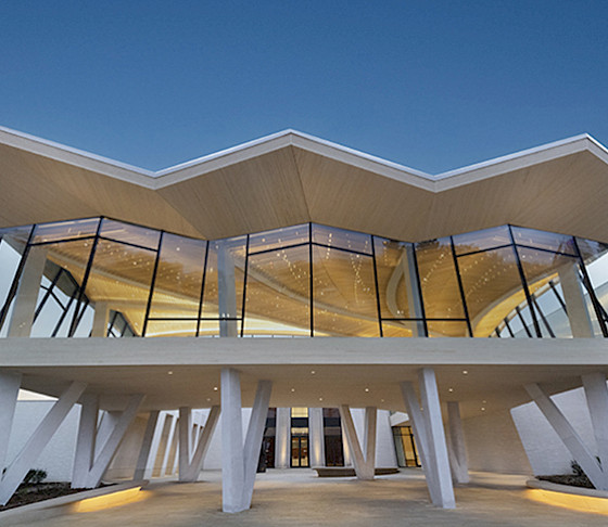 Nighttime photo of the Park Entrance to the Arkansas Museum of Fine Arts.