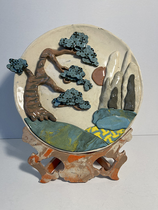 David R., "Ornamental Plate," porcelain and mason stains, Ninth Grade, Thaden School, Art Educator: Nina Buonaiuto.